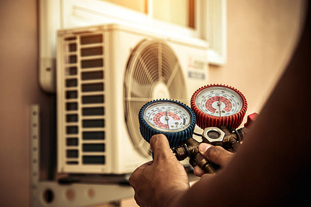 Professional Heat Pump Repair technician working in Monkton, MD